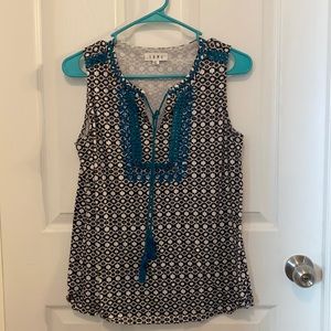 Cute tank top, worn only a few times.